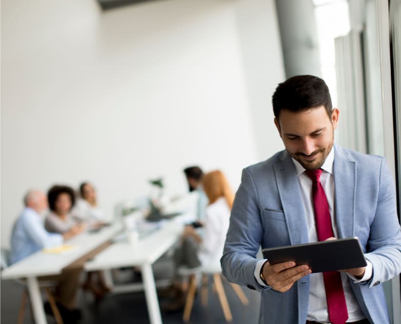 Picture of man holding a Tablet